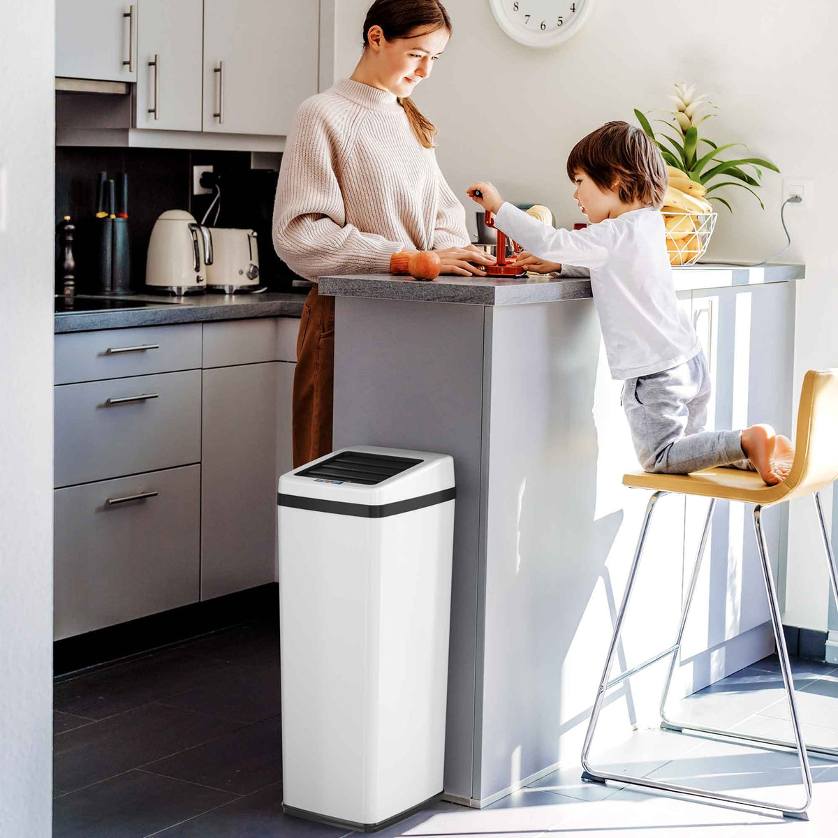 iTouchless 14 Gallon White Stainless Steel Sliding Lid Sensor Trash Can with Odor Filter in kitchen