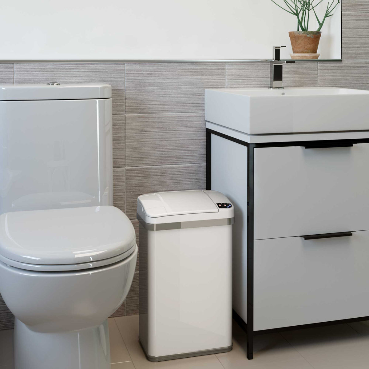 4 Gallon / 15 Liter White Sensor Bathroom Trash Can with Odor Filter and Lemon Fragrance in bathroom