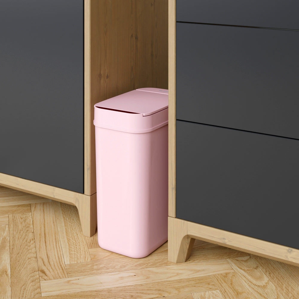 3 Gallon / 10 Liter Plastic Sensor Trash Can (Pink) in home office