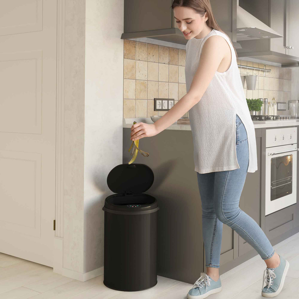 iTouchless 8 Gallon Black Stainless Steel Sensor Trash Can with Odor Filter in kitchen