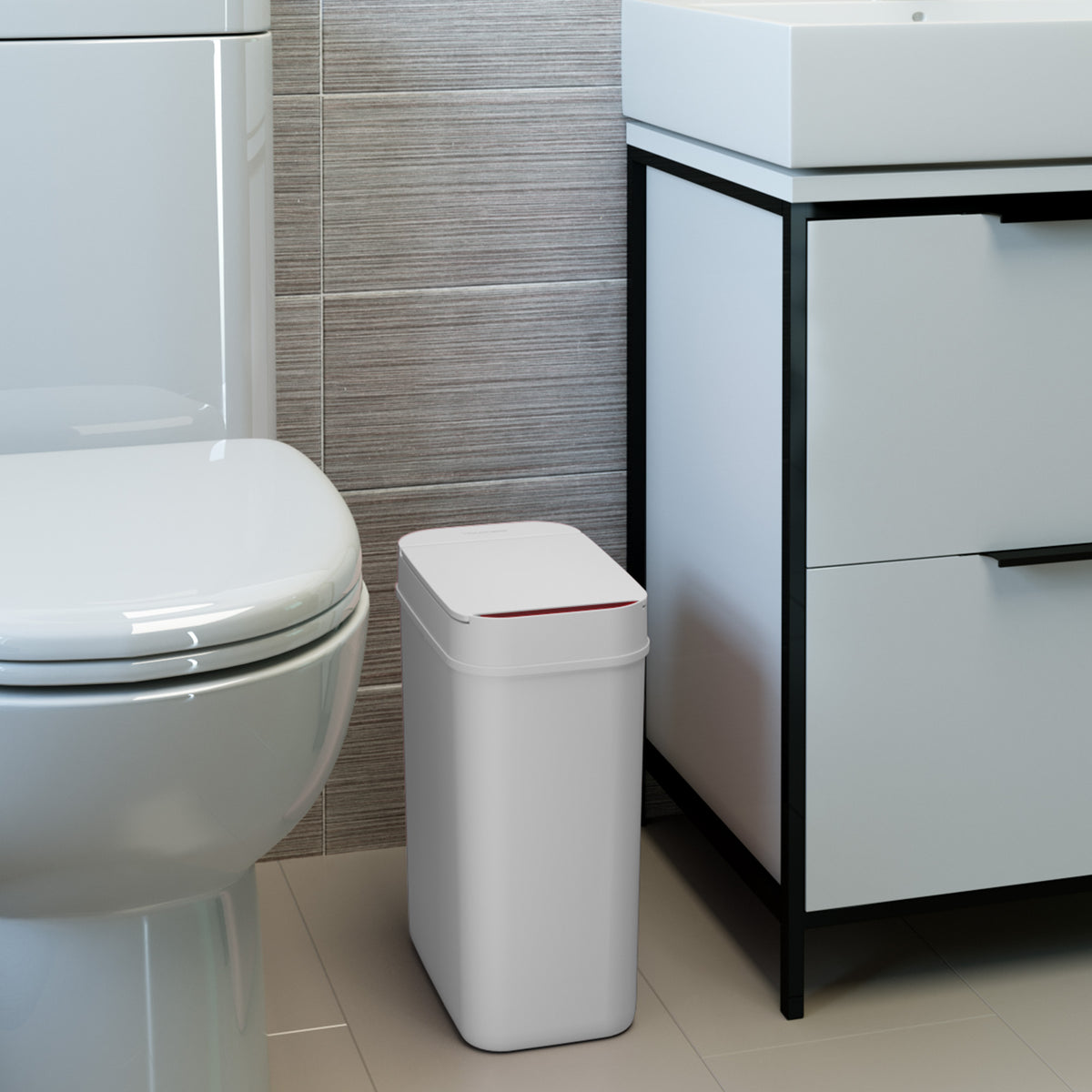 3 Gallon / 10 Liter Plastic Sensor Trash Can (White) in bathroom