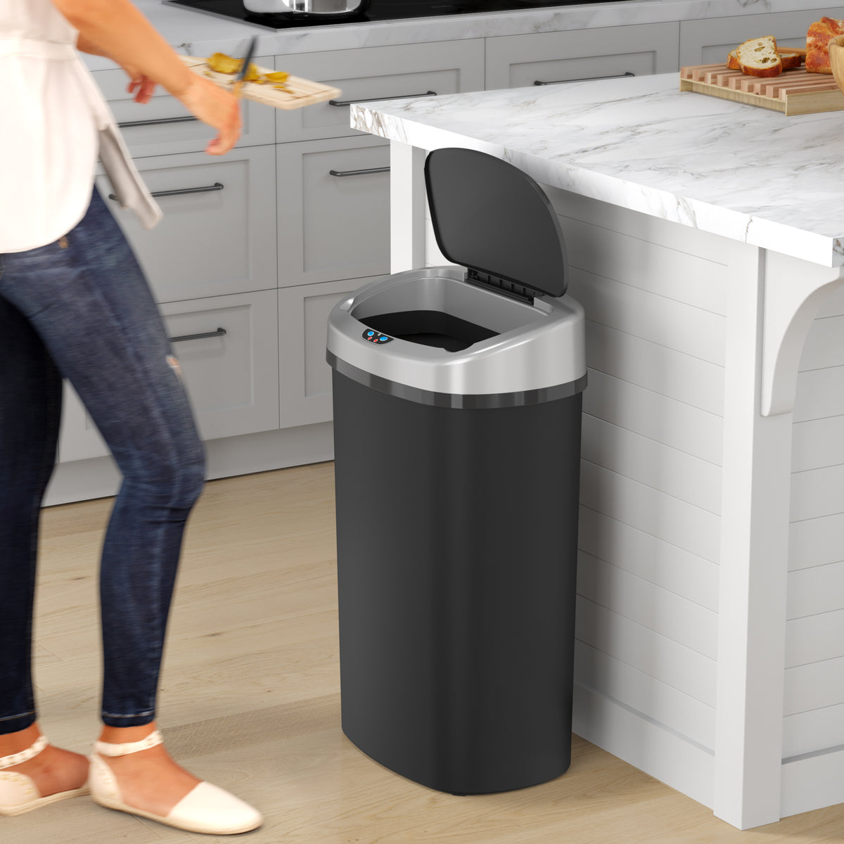 13 Gallon Oval Plastic Sensor Trash Can with AbsorbX Odor Filter in kitchen