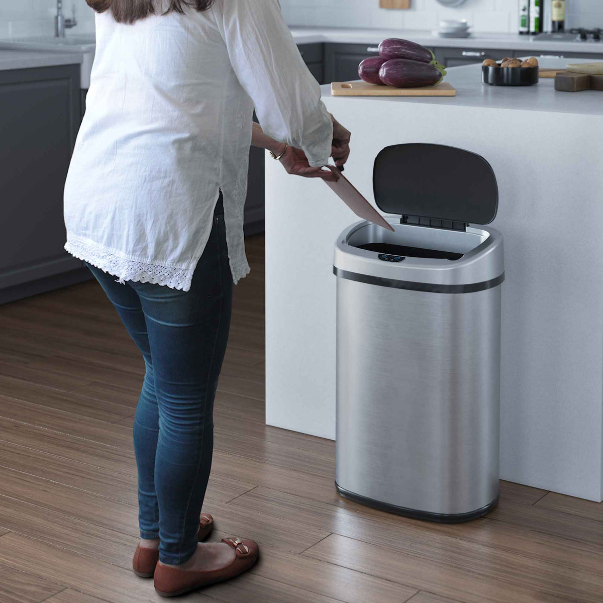 iTouchless 13 Gallon Oval Sensor Trash Can with Odor Filter in kitchen